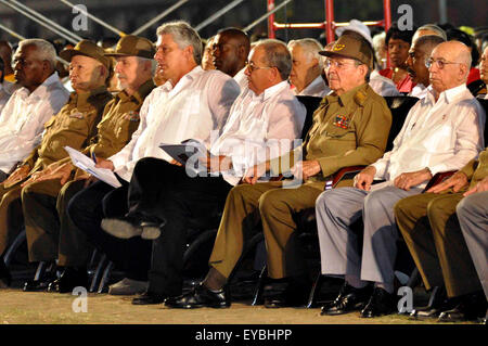 (150726) -- SANTIAGO DE CUBA, July 26, 2015 (Xinhua) -- Cuba's President Raul Castro (2nd,R) and Cuban Vice President of the Councils of State and Ministers, Jose Ramon Machado Ventura (1st,R), attend the national event to commemorate the 62th anniversary of the assaults to the Barracks Moncada and Carlos Manuel de Cespedes, in Santiago de Cuba, Cuba, on July 26, 2015. To finish the blockade of United States to Cuba and return the territory occupied by the Guantanamo Naval Base are conditions for normalizing relations, reiterated on Sunday by Cuban Vice President Jose Ramon Machado Ventura. (X Stock Photo