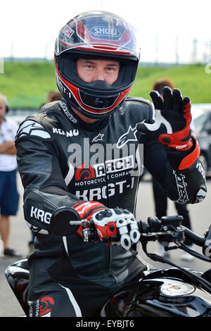 Actor Keanu Reeves test-rides his Arch Motorcycle 'KRGT-1' during the Suzuka 8 Hours FIM Endurance world championship at Suzuka Circuit in Mie prefecture, Japan on July 25, 2015. Stock Photo