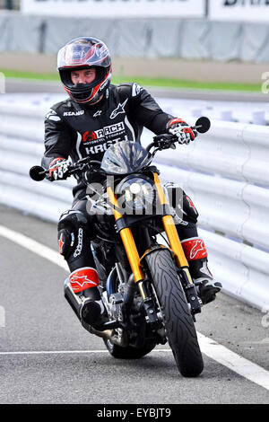 Actor Keanu Reeves test-rides his Arch Motorcycle 'KRGT-1' during the Suzuka 8 Hours FIM Endurance world championship at Suzuka Circuit in Mie prefecture, Japan on July 25, 2015. Stock Photo