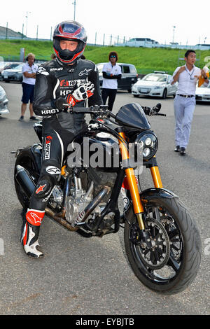 Actor Keanu Reeves test-rides his Arch Motorcycle 'KRGT-1' during the Suzuka 8 Hours FIM Endurance world championship at Suzuka Circuit in Mie prefecture, Japan on July 25, 2015. Stock Photo