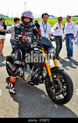 Actor Keanu Reeves test-rides his Arch Motorcycle 'KRGT-1' during the Suzuka 8 Hours FIM Endurance world championship at Suzuka Circuit in Mie prefecture, Japan on July 25, 2015. Stock Photo