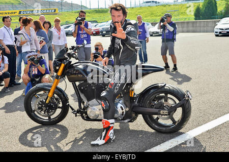 Actor Keanu Reeves test-rides his Arch Motorcycle 'KRGT-1' during the Suzuka 8 Hours FIM Endurance world championship at Suzuka Circuit in Mie prefecture, Japan on July 25, 2015. Stock Photo