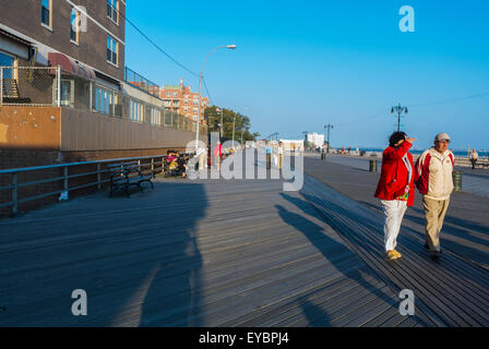 Coney Island, NY, USA, Resort Town Scenes, peninsular residential neighborhood, beach, and leisure/entertainment destination on the Atlantic Ocean in the southwestern part of the borough of Brooklyn, People Walking on Boardwalk, Holidays in New York Stock Photo