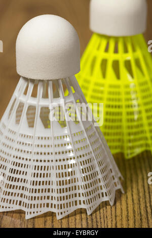 shuttlecocks for badminton white and yellow on the wooden floor Stock Photo