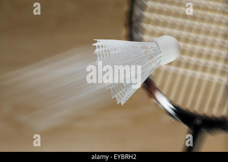 White shuttlecock and racket badminton in flight Stock Photo