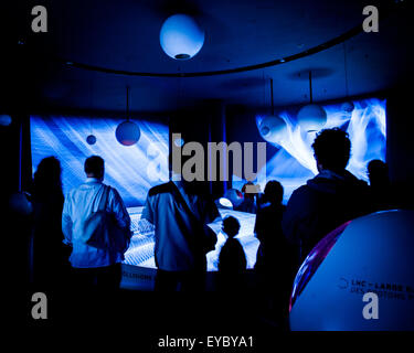 People at the CERN Visitor Centre in Geneva, Switzerland.  CERN is the European Organisation for Nuclear Research Stock Photo