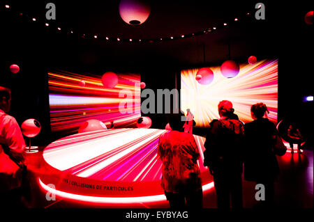 People at the CERN Visitor Centre in Geneva, Switzerland.  CERN is the European Organisation for Nuclear Research Stock Photo