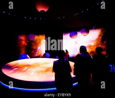 People at the CERN Visitor Centre in Geneva, Switzerland.  CERN is the European Organisation for Nuclear Research Stock Photo