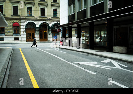 Swiss businessman walking through Geneva with briefcase Stock Photo