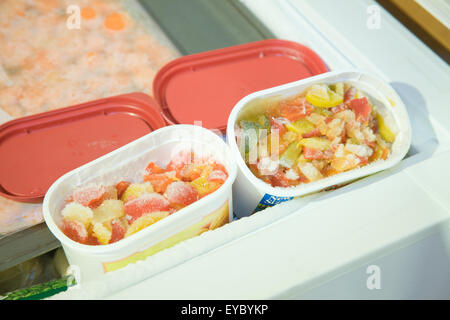 Containers and plastic bags with vegetables in refrigerator Stock Photo -  Alamy