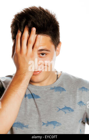 young pretty man isolated with hands on head little angry and confused Stock Photo