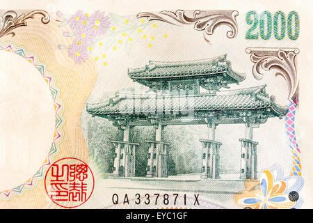 Detail of obverse of a Japanese 2000 Yen banknote with the value and picture of the Shureimon, a 16th century gate at Shuri castle in Okinawa. Stock Photo