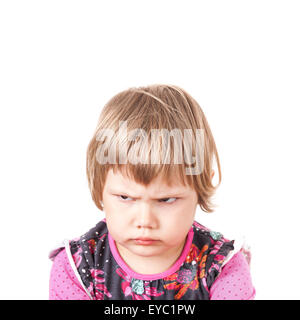 Cute Caucasian blond baby girl angry frowns, studio portrait isolated on white background Stock Photo