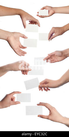 Set of hands holding empty business cards on white Stock Photo