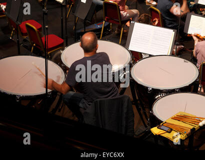 Timpani player in an orchestra rehearsal practice Stock Photo - Alamy