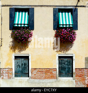 two doors and two windows house building in Murano, Venice, Italy Stock Photo