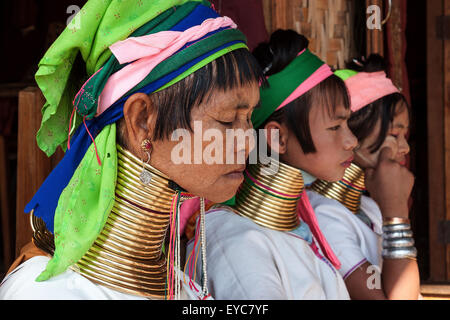 Women from the Padaung tribe in typical dress and headgear, necklaces, Inle Lake, Shan State, Myanmar