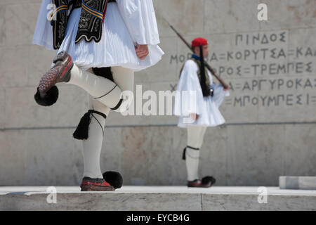 Guard change. A Greek guard (or Tsolias) marching towards the Unknown soldier monument in Syntagma, Athens, Greece. Stock Photo
