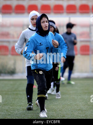 Kabul, Afghanistan. 26th July, 2015. Members of Afghanistan's women's national football team take part in a training session in Kabul, Afghanistan, on July 26, 2015. Afghanistan's women's national football team was established 10 years ago with very preliminary facilities and fewer players, and has achieved a considerable progress after these years, participating in many national and international matches. © Ahmad Massoud/Xinhua/Alamy Live News Stock Photo