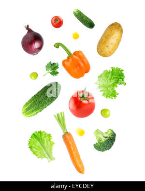 Falling fresh vegetables on white background Stock Photo