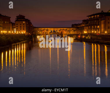 Ponte Vecchio at sunset and the river Arno. Florence, Italy. Stock Photo