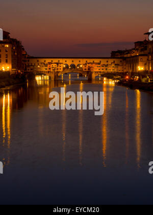 Ponte Vecchio at sunset and the river Arno. Florence, Italy. Stock Photo