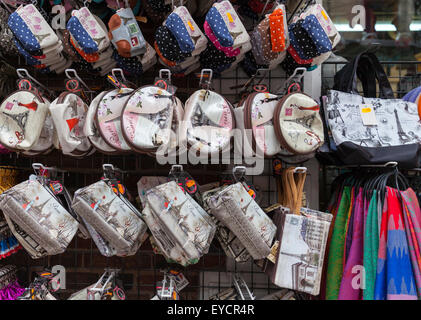 Paris souvenir bags and purses displayed outside gift shop in Montmartre, Paris Stock Photo