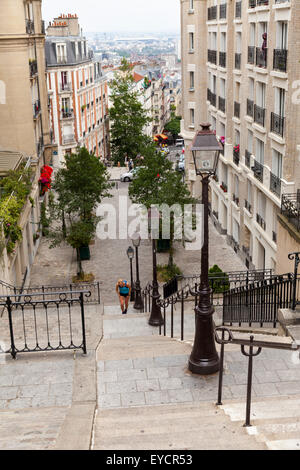 View down the steep steps at Rue du Mont Cenis towards the North of Montmartre District in Paris, France Stock Photo