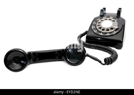 Classic vintage rotary telephone with receiver in foreground and base in background out of focus Stock Photo