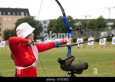 Copenhagen, Denmark, July 27th, 2015. Chinese arche Jueman Zhu takes aim for her shoot in the qualifying round in recurve bow at the World Archery Championships in Copenhagen Stock Photo