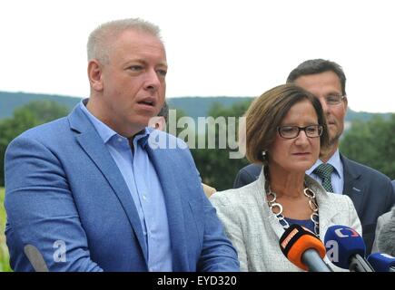 Austrian and Czech interior ministers Johanna Mikl-Leitner (second from right) and Milan Chovanec (left) speak during a press conference after their talks about police cooperation, security and migration affairs in Mikulov, Czech Republic, July 27, 2015. (CTK Photo/Igor Zehl) Stock Photo