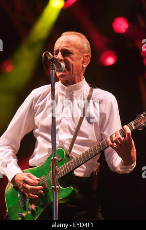 Francis Rossi of the legendary rock band, Status Quo, entertaining the crowd  at the 25th Anniversary Silverstone Classic 2015 Stock Photo