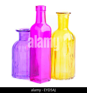 Three colorful bottles, isolated on white background Stock Photo