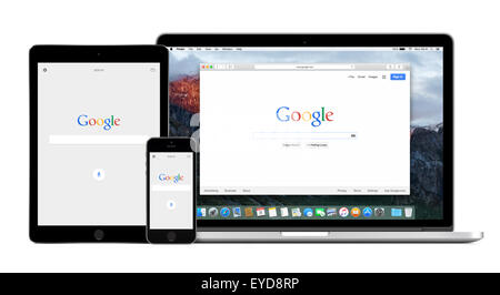 Varna, Bulgaria - February 02, 2015: Google app on Apple iPhone and iPad displays and Google search on Apple Macbook Pro screen. Stock Photo