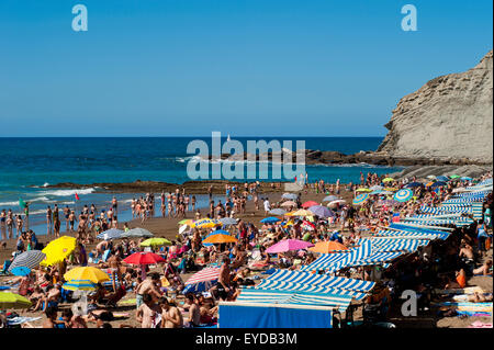 Sunbathing At Itzurun Beach, Zumaia, Basque Country, Spain Stock Photo