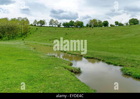 Background of sky, clouds, field  and river    Ludogorie, Bulgaria Stock Photo