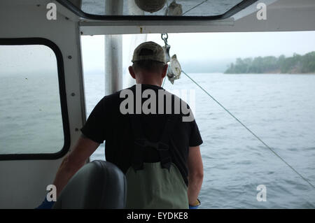 Lobster fishermen in Cape Breton, Nova Scotia. Stock Photo