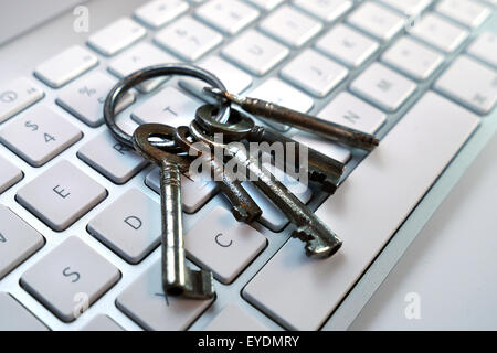 old key on computer keyboard Stock Photo