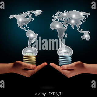 Global creativity business success concept as people holding ligh t bulbs shaped as world continents as a financial trade symbol for creative collaboration and exchange of innovation. Stock Photo