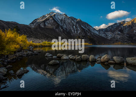 Early morning reflections on Convict Lake, Sierra Nevada Mts Stock Photo