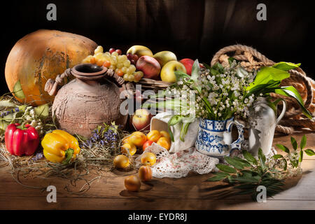 still life composition light brush table tableware fruits apple ceramic old retro country rural canvas wood object objects Stock Photo