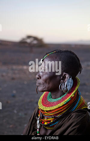 Kenya, Portrait of traditionally dressed Turkana woman on Lake Turkana; Loyangalani Stock Photo