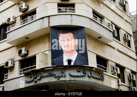 Photo of president Bashar al-Assad on a building in the capital city before the outbreak of the civil war - Damascus - Syria Stock Photo