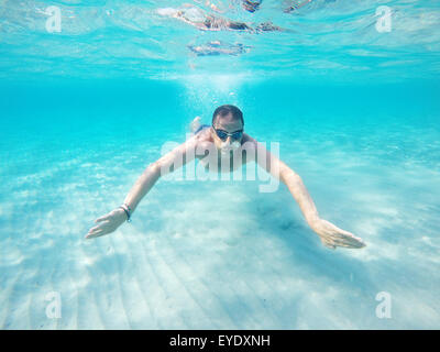 Swimming under the water in a clear sea Stock Photo