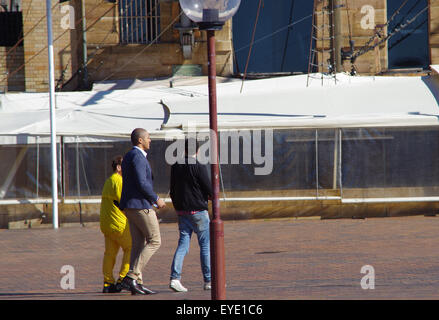 Sydney, Australia. 27th July, 2015. Geoffrey Eldesten, Blake Garvey and James Mathison can be seen walking together during filming for Australian Celebrity Apprentice 2015 at The Rocks, Sydney, Australia on Monday, 27th July 2015 Credit:  Romina01/Alamy Live News Stock Photo