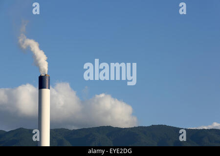 Industrial refinery plant with smoke stack Stock Photo