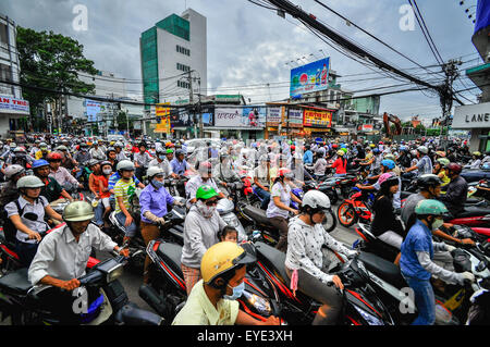 Saigon, Vietnam - June 15: Road Traffic on June 15, 2011 in Saigon (Ho Chi Minh City), Vietnam. Ho Chi Minh is the biggest city Stock Photo