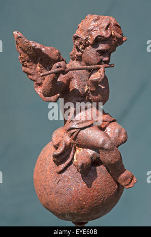 Little angel figurine with flute, made of iron, Germany Stock Photo