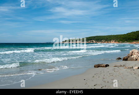 Waves wash the beautiful empty beach at Binigaus on the island of Menorca Spain Stock Photo