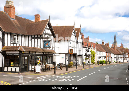 Cafe and ice cream parlour timber framed cottages line the high street in Henley in Arden, Warwickshire, England, UK Stock Photo